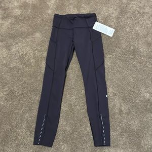 Lululemon Fast and Free 7/8 Tight II deep purple size 4 EUC NULUX